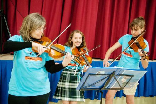 Blue Skies Fiddle Orchestra perfoms and CFKA grant announcements